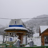 雪の中のロープウェイ