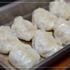 江南 - 料理写真:「江南本店餃子」自慢の手づくり、一口サイズのあっさり薄皮餃子