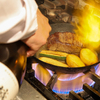 豪快イタリアン食堂 DESERT - 料理写真:蝦夷鹿のステーキ麒麟山にてフランベ