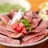 Rusoreiyu - 料理写真:自慢のお肉が載った『穀物100％牛特上サーロイン丼』
                      お肉が大好きな人が笑顔になる、大満足の美味しさを誇るお肉がのった丼。味噌汁＆サラダ付き。
                      