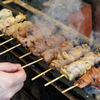 焼鳥どん - メイン写真:焼鳥焼いている瞬間