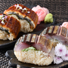 ジャポニカスタンド - メイン写真:鰻の棒寿司　鯖の棒寿司