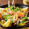 オラオーレ スペインタパスと自然派ワインの店 - メイン写真:贅沢魚介の玄米パエリア