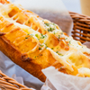 ベーカリーカフェフラミンゴ - 料理写真:飽きの来ないおいしさ『ベーコンポテトドッグ』