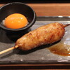やき鶏 義 - 料理写真:つくね（黄身付き）