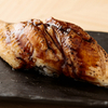 Tsukiji Koromosushi - 料理写真:口の中でふわりと溶ける、インパクトのある旨さ『穴子の握り』