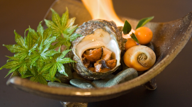 四国三郎 よしの川 - 料理写真:活さざえの壺焼き