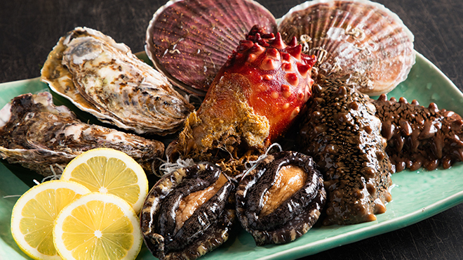 居酒屋 勇旬 いか太郎 - メイン写真:活ホタテ、活アワビ