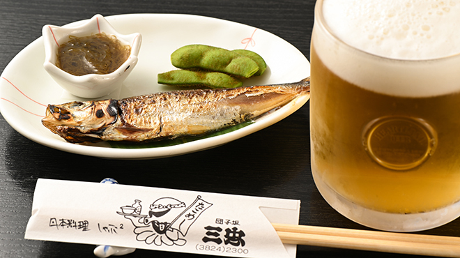 三忠 - メイン写真:お通し・ハートランド生ビール