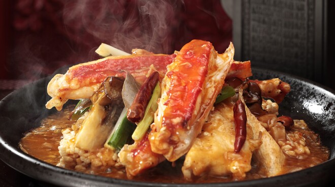 銀座アスター - 料理写真:たらば蟹のXO醤炒め、陶板仕立て