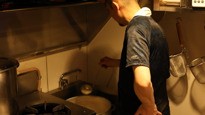 韓国居酒屋 韓謝亭 - メイン写真:スープの調理風景