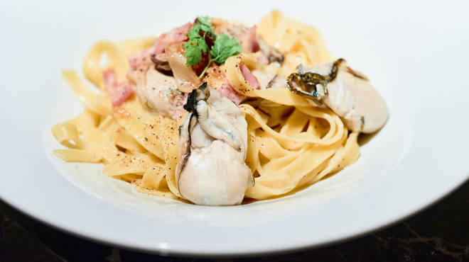 ASADOR EL CIELO - 料理写真:名物牡蠣ペペロンチーノ