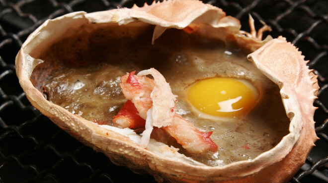 赤羽 トロ函 - 料理写真:カニ味噌の甲羅焼　￥548