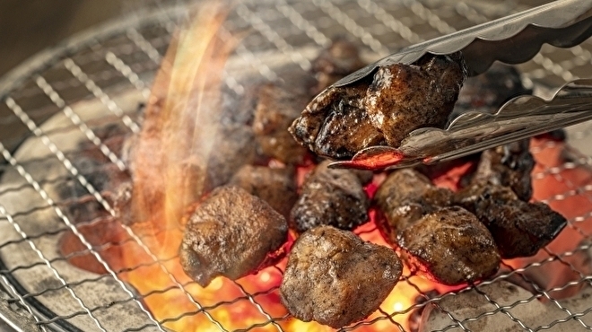 もつ鍋 鉄鍋餃子 鳥炭火焼き 九州酒場 丸九 - メイン写真: