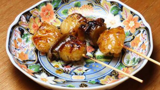 朝挽き もつ焼き フィーバータイガー - 料理写真: