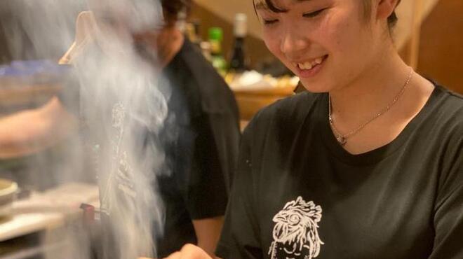 丸鶏料理と濃厚水炊き鍋 鳥肌 - メイン写真: