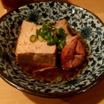 ちょぼや - 突き出し 手羽と豆腐の煮物