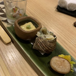Yura - 手前からイカめし、南瓜の浅漬け、サザエ山葵漬け和え、蟹味噌豆腐、ナマコ