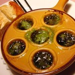 Hot whelk and mushroom escargot style served with baguette
