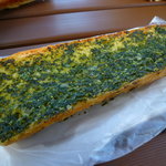 ブーランジェリー タカス - 【フランスパンのエスカルゴバター焼き（ハーフ）　１８４円】