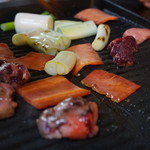 かたつむり - 鉄板焼きの様子