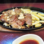 酒肴商店 アジト - テキサスビッグステーキ(ハーフ)