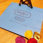 マリベル - 紙袋の底に4色の花びらが…♡