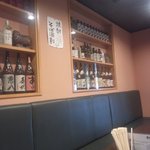 だんだん - 店内は焼酎がズラリ