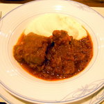 どうろくじん - 豚肉のトマト煮