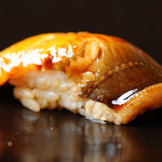 A nigiri course that is eaten all at once as if to signal noon.