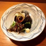 小魚料理 とみ助 - さざえの壷焼きです。壺の中には絶品出汁と食べ易く刻んださざえの身が入っています(o^^o)