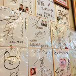 Momburan - お店の人中に飾られているサイン達