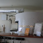 アッツケ ピッツァ - 入口にある薪窯です