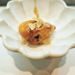 寿司栄 - アン肝の飴煮いぶりがっこを添えて