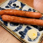 炭火の焼きとんともつ煮込み専門個室居酒屋 小倉やきとん酒場 - ピリ辛ウインナー