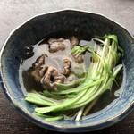 徳山鮓 - 小皿によそわれた月の輪熊とセリが抜群の相性。