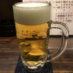 炭火居酒屋 めろーばーど - 生ビールは一番搾りです。