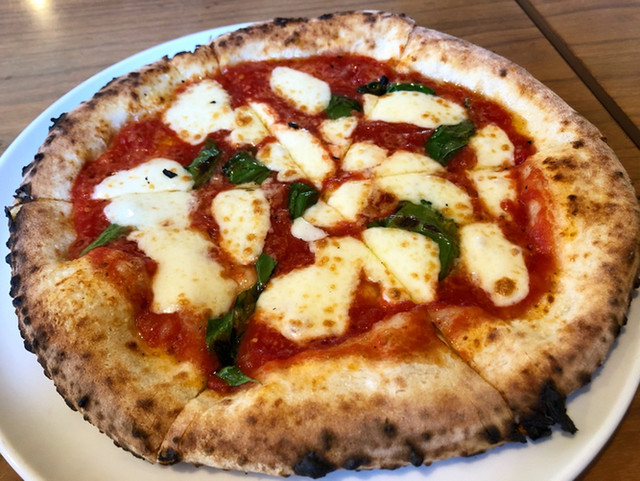 ナストロ  - 鏡石（ピザ）の写真