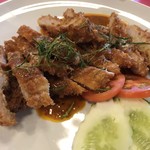 Tate Cafe Restaurant - Deep Fried Pork topped with Red Curry Sauce and Shredded Kaffir Leaves