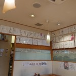 Ikameshiya Hourin - 店内にはサインがいっぱい