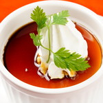 Homemade pudding with yuzu-scented caramel sauce