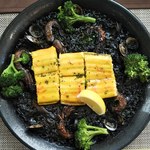 Cucina cantare - 料理写真:地元名産大穴子と吉賀町産サフランの黄金イカスミパエリア