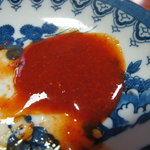 やきとり処地鶏屋 - 自慢の辛味ダレ