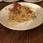 オステリア イマムラ - 足赤エビとトマトのリングイネ