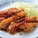 新世界もつ鍋屋 - 手羽先ピリ辛スティック