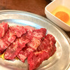 焼肉たまい - 料理写真:金運カルビ（100円）なんども言いますが、100円で肉と卵がセットとは驚きの価格。お一人様一皿限定。そりゃそうだ。「お客様が、お得になるように考案したメニューです。赤字覚悟の大サービス品。食べて得して金運アップしてください♪」と。
