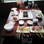 パンダの店と大黒様 御経塚店 - 入り口横のテーブル席です。