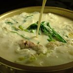 ふじの精肉店 - 豆乳を入れると「雪見もつ鍋」醤油ベースのもつ鍋に豆乳を…ボトルで提供するので量もお好みで★＋480円