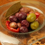 Marinated olives and sun-dried tomatoes from Marche, Italy