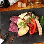 Assortment of 6 types of oven-roasted vegetables served with sulfur-flavored rock salt